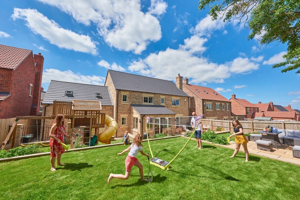 Lifestyle Image Family Playing Garden