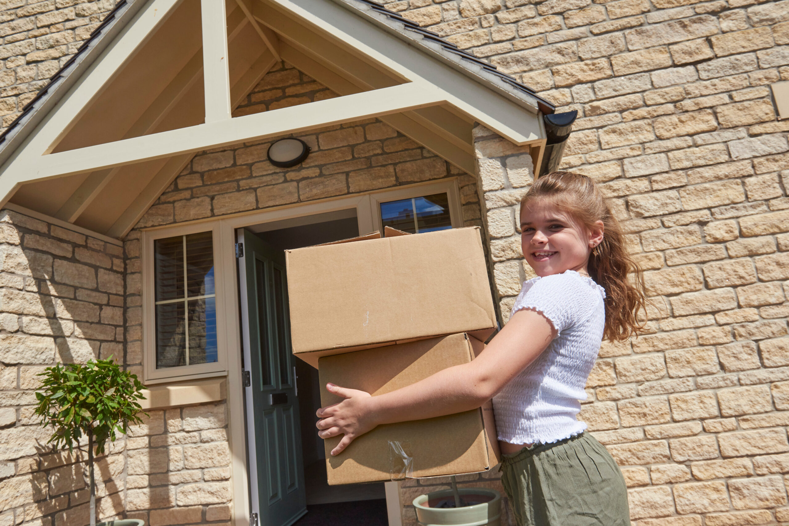 Lifestyle Image Child Boxes Moving In