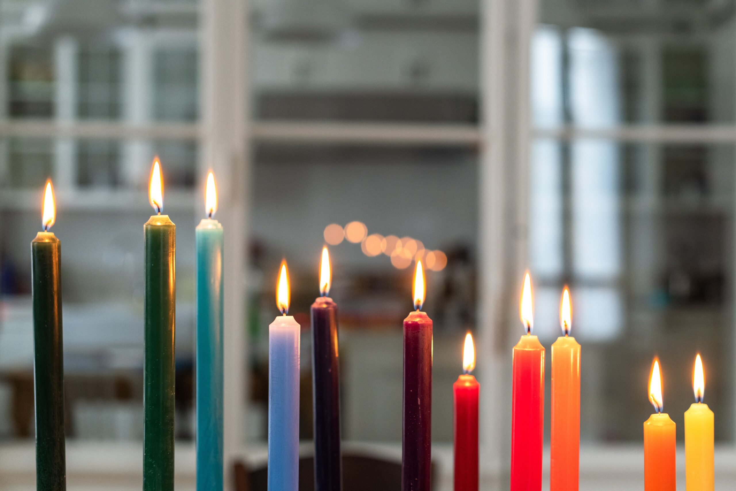 Colourful candles lit