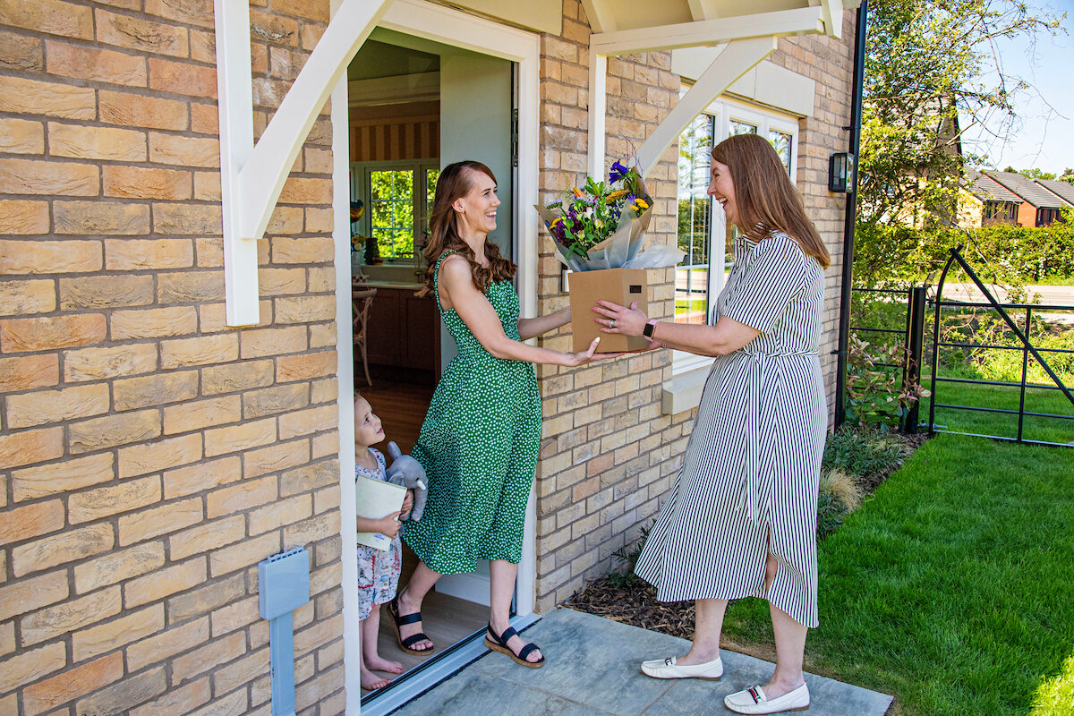 lindum Sales adviser welcoming customer new home