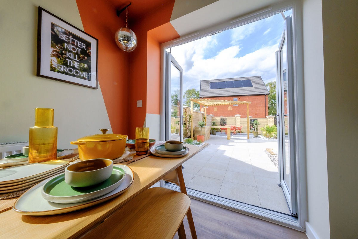 One at Charterholme show home dining to garden